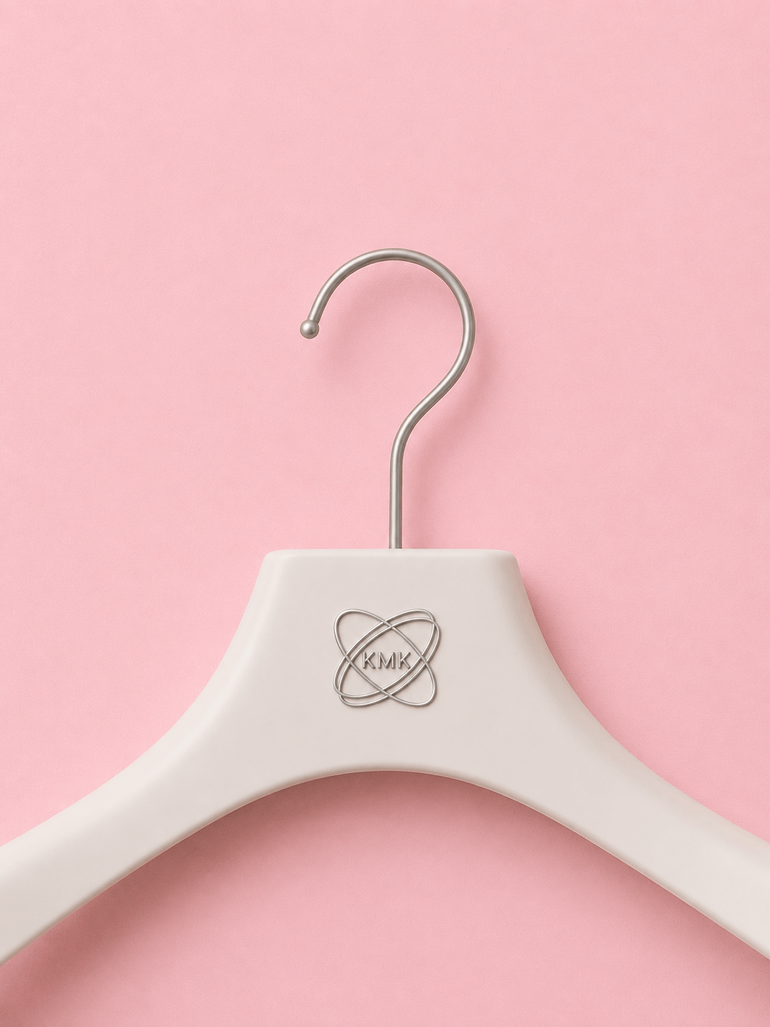 K.KMK Wear hanger with the silver studio emblem